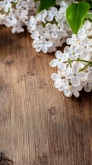 Fototapeta premium White flowers scattered on aged wooden surface create a serene and natural setting