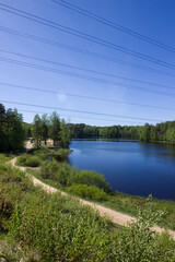 Obraz premium Blue lake in the forest. Yukki village.