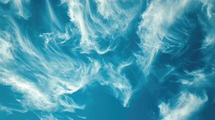 Obraz premium Cumulus and stratocumulus clouds drifting across a vibrant blue sky showcasing the beauty of nature in a serene timelapse view