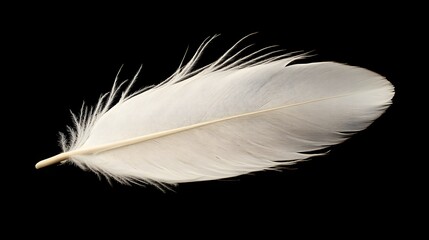 Obraz premium A soft white feather gently floating mid-air on a dark brown background.