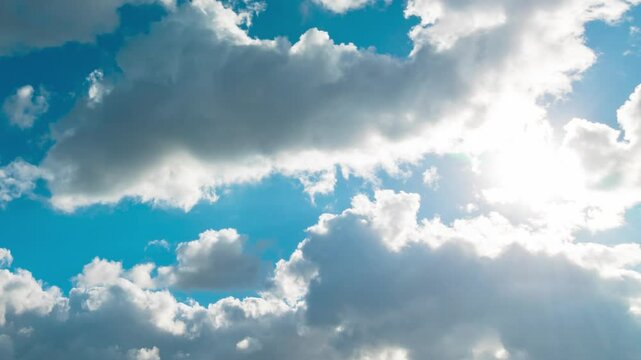 Clouds and sun timelapse 4k video. Landscape background footage. Motion of the clouds time lapse.