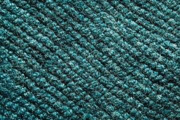 Closeup of Textured Teal Woven Carpet