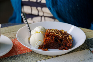 Greek walnut cake with ice cream in the mountain village of Lefkara on the island of Cyprus in Greece