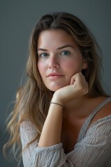 Portrait of a young woman with natural beauty in soft lighting