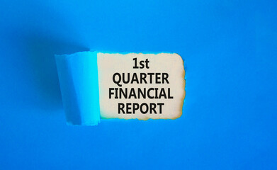 1st quarter financial report symbol. Concept words 1st quarter financial report on beautiful white paper. Beautiful blue background. Business 1st quarter financial report concept. Copy space.