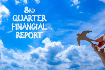 3rd quarter financial report symbol. Concept words 3rd quarter financial report. Beautiful blue sky and clouds background. Businessman hand. Business 3rd quarter financial report concept. Copy space.