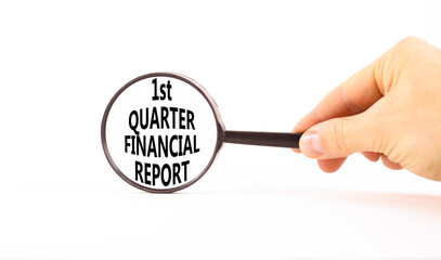 1st quarter financial report symbol. Concept words 1st quarter financial report on beautiful magnifying glass. Beautiful white background. Business 1st quarter financial report concept. Copy space.