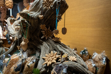 Stella Alpina, Edelweiss flower, Alpine Edelweiss flowers, photo of a rare mountain white flower between rocks taken on the Italian Alps, crafted in wood by a South Tyrolean artisan.