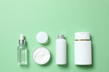 Natural cosmetic products on color background, top view