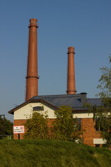 Fototapeta premium Industrial building chimneys made of bricks. Kronstadt