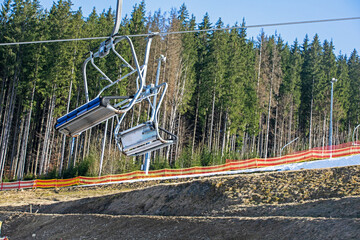 ski lift without people on a sunny day on the slope. Leisure. school break