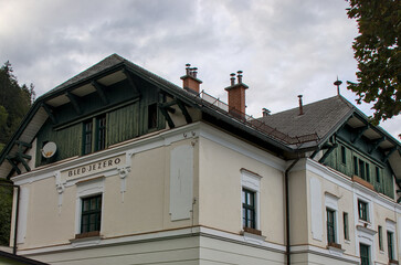 Bled, Slovenia - Sept 25, 2024: Train station sign on building in Bled, Slovenia, a popular...