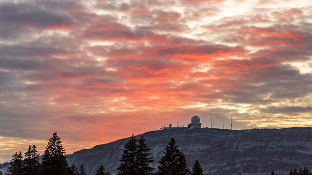 Air Traffic Control Center at La Dole with a Vibrant Sunset