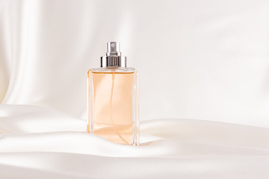 Elegant Square Perfume Bottle on Soft White Background