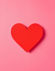 Vibrant Red Paper Heart Shape on Bright Pink Background with High-Contrast Lighting for Adobe Stock Photos