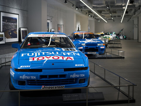 FUJI, JAPAN - 23 NOVEMBER 2024: ON DISPLAY AT THE FUJI SPEEDWAY MOTOR MUSEUM, VINTAGE MOTORSPORT ICON, THE JZA70 FUJITSU TEN SUPER GT GT500 TOYOTA SUPRA, NISSAN R32 CALSONIC SKYLINE AND CAR COLLECTION