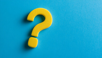 Bright yellow question mark on vibrant blue background symbolizes curiosity and inquiry in colorful design