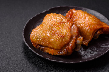 Chicken thighs fried with salt, spices and herbs