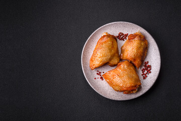 Chicken thighs fried with salt, spices and herbs