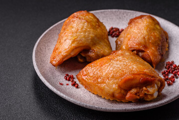 Chicken thighs fried with salt, spices and herbs