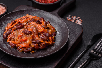 Vegan or vegetarian stew with red beans, onions and carrots or lobio