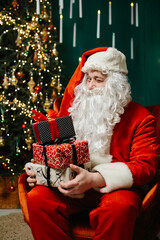 Exhausted and emotionally drained Santa Claus sitting in a chair by the Christmas tree, holding gifts, looking weary and overwhelmed.