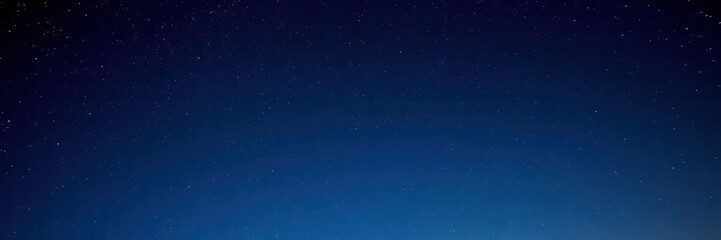 Fototapeta premium A stunning view of the starry night sky filled with twinkling stars, tranquil, starry night, night time
