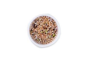 Spicy sesame seeds scallion soy sauce in a white bowl on a white isolated background
