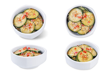Cucumber spicy asian salad in a bowl on a white isolated background