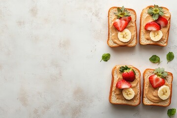 Collection of toasted peanut butter sandwiches with banana fresh strawberries and jelly Wholesome breakfast Overhead shot on white surface Space for text