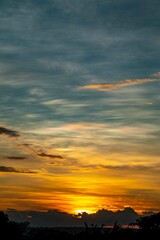 Sunrise with intense natural orange lights and idyllic dramatic scenery
