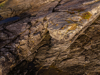 Textured Coastal Rock Formation in Golden Hour Light