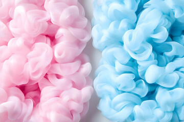 Obraz premium Abstract pink and blue ink swirls in water.