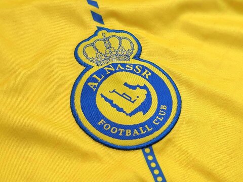 Closeup view of Al Nassr Football Club emblem, a professional football club based in Riyadh, Saudi Arabia.