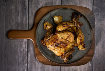 Whole chicken rotisory grilled