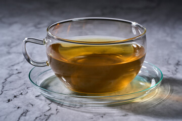 Hot Japanese Sencha tea in a glass cup