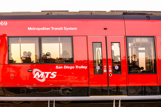 People riding MTS Trolley San Diego California December 6 2024 