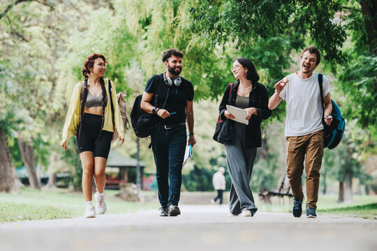 A group of students and a professor take a relaxing stroll in the park, enjoying ice cream and conversation after classes. The scene depicts a harmonious blend of learning and leisure.