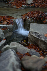 A small waterfall by the river.
