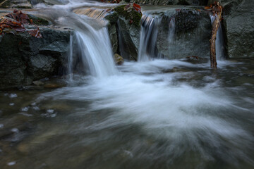 A small waterfall by the river.
