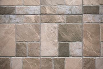 Textured ceramic tiles imitating stone