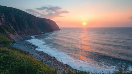 Sunrise illuminating rugged cliffs and atlantic ocean on cape breton island, nova scotia, canada