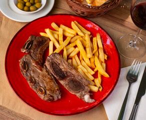 Delicious beef steak with fried potatoes served on plate