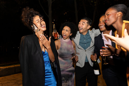 Vibrant City Night, Friends Celebrating Together Outdoors