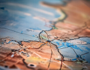 Naklejka premium Close-Up of a Map Highlighting Navigation and Geography