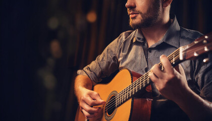 Obraz premium Close-Up of a Musician Playing an Instrument