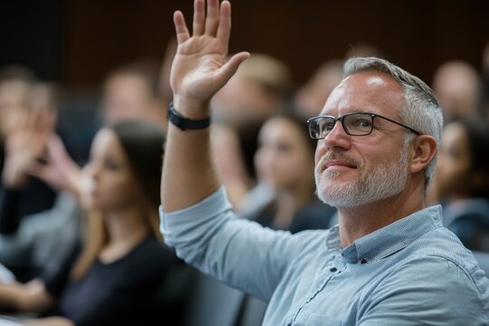 A curious audience actively engages in an educational talk, raising hands and sharing thoughts, exemplifying a collaborative learning environment filled with ideas and knowledge exchange.