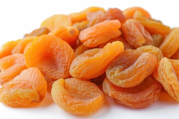 Close up of dried apricots on white background