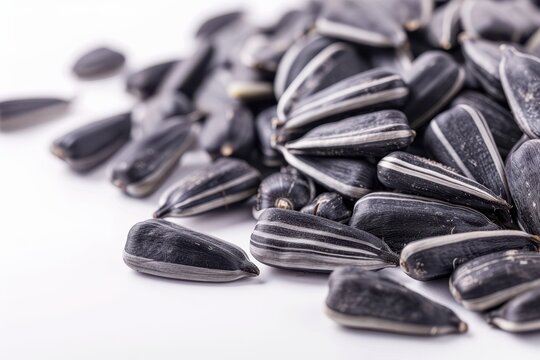 Close up of yummy sunflower seeds on white background
