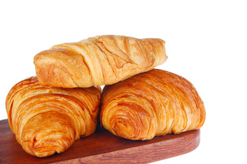 Crisp fresh croissants in the background